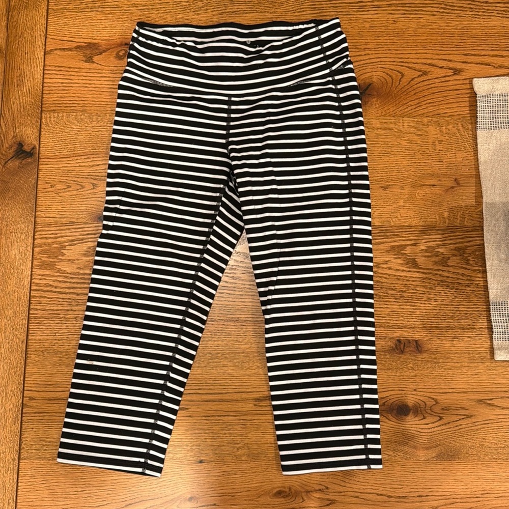 Athleta striped leggings.  NOT to ankle….to calf.  Medium